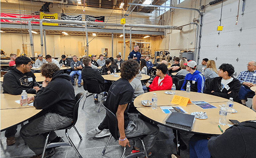 Students and professionals gathered in a workshop for Builders & Burritos event.