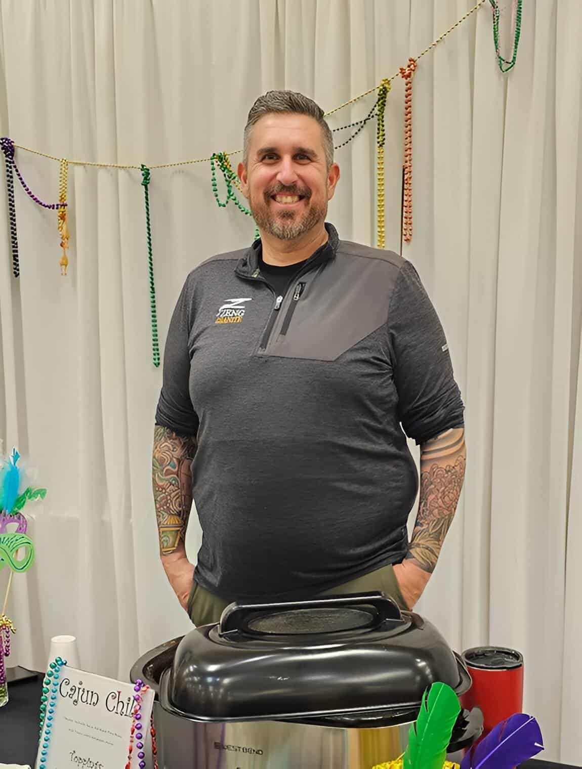 Man smiling at the camera at the 2025 Soup 'r Chili Contest.