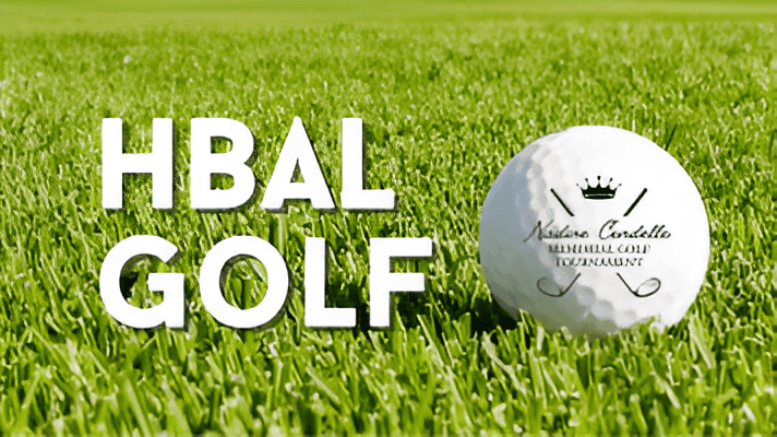 HBAL Golf Tournament ball on lush green grass.